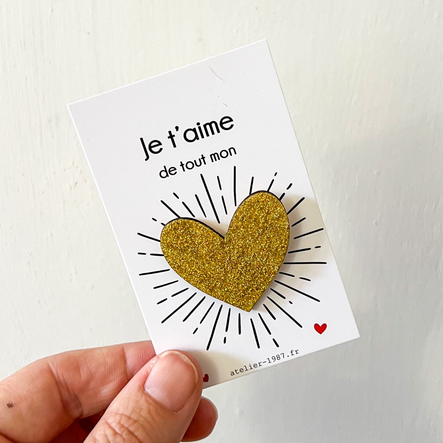 Pin’s cœur paillettes dorées