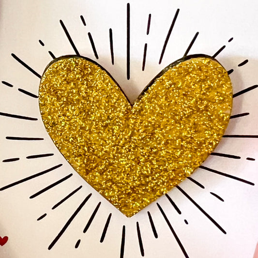 Pin’s cœur paillettes dorées